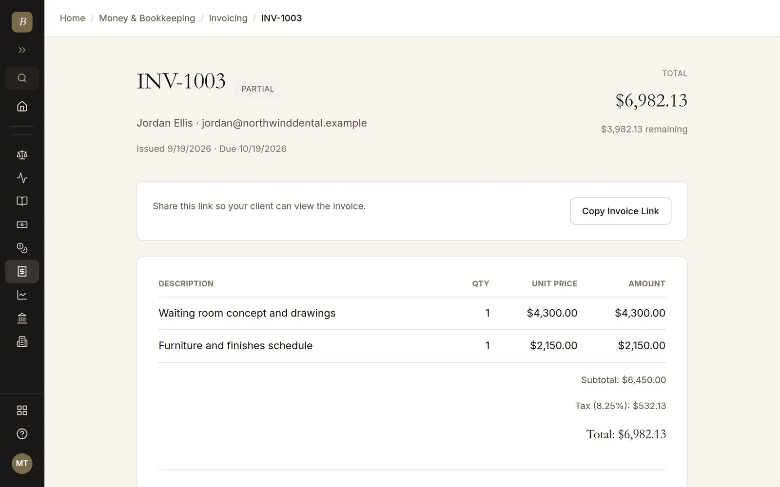 An invoice with line items, tax and a payment recorded